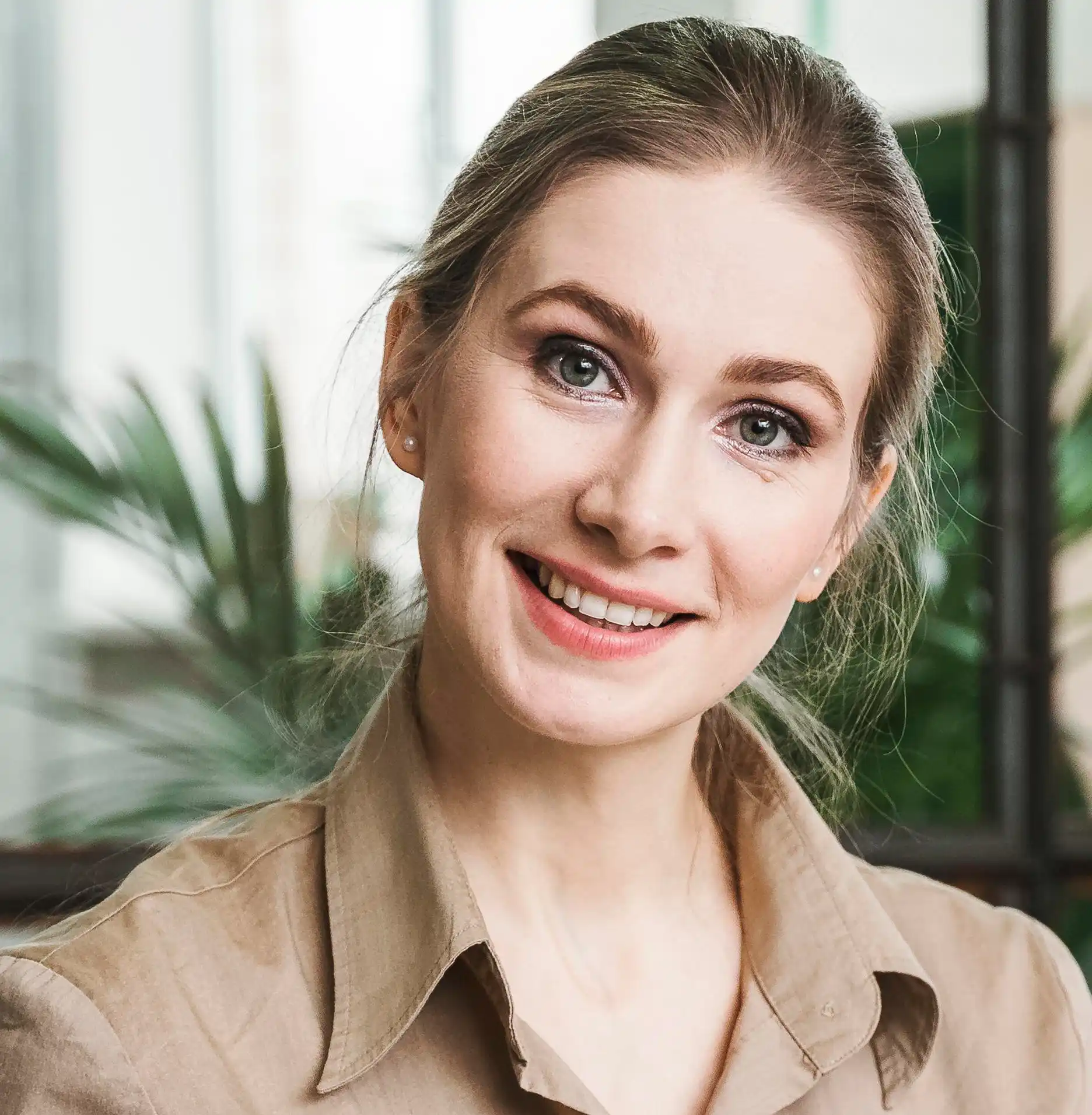 smiley businesswoman posing meeting indoors